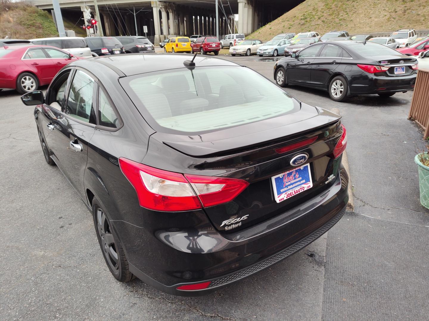 2014 Black Ford Focus (1FADP3F27EL) , Automatic transmission, located at 5700 Curlew Drive, Norfolk, VA, 23502, (757) 455-6330, 36.841885, -76.209412 - Photo#13